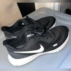 Nike Revolution running shoes, size 9, black & white